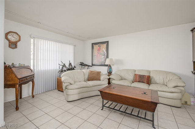 living area with light tile patterned flooring