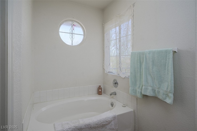 full bathroom featuring a garden tub