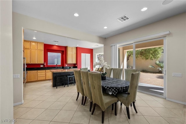 dining room with light tile patterned floors, baseboards, visible vents, and recessed lighting