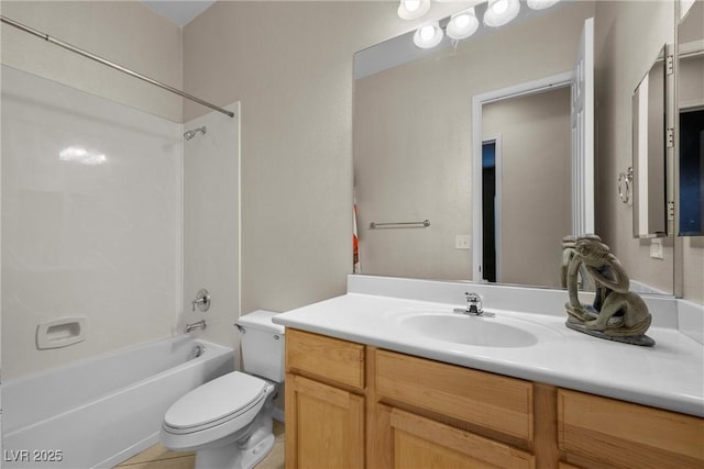 full bath featuring toilet, tile patterned flooring, tub / shower combination, and vanity