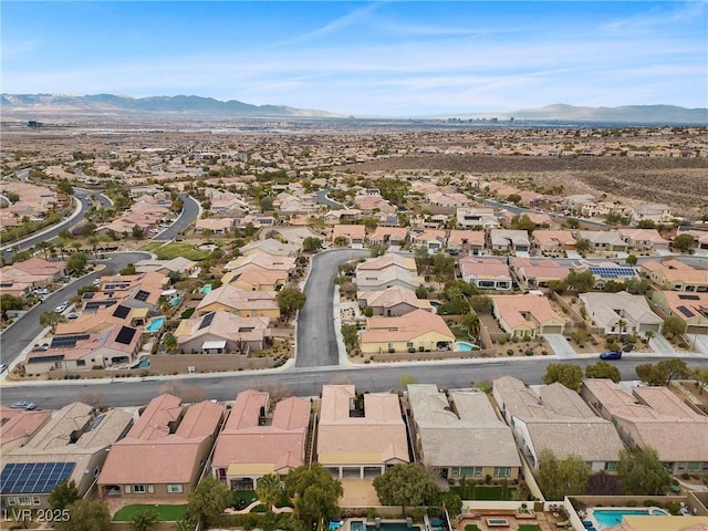 bird's eye view with a residential view and a mountain view