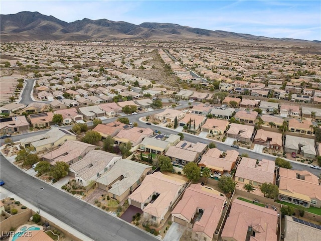 drone / aerial view with a mountain view and a residential view