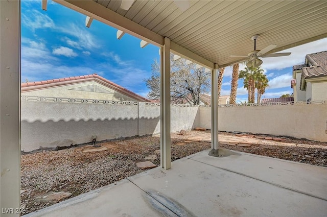 view of patio / terrace with a fenced backyard and a ceiling fan