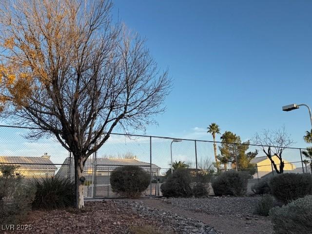 view of yard featuring a gate and fence