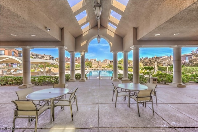 view of patio / terrace featuring an outdoor pool