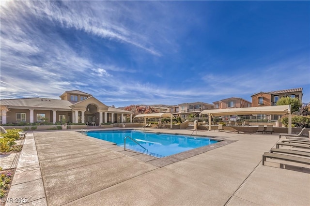 pool featuring a patio area