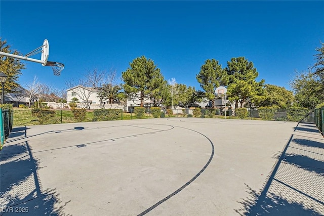 view of sport court with community basketball court and fence