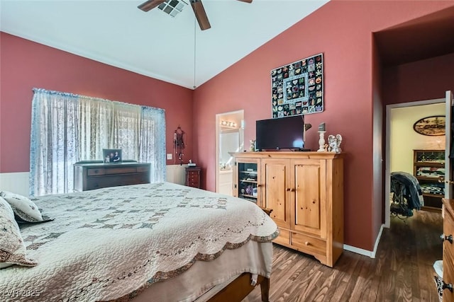 bedroom with baseboards, a ceiling fan, vaulted ceiling, and wood finished floors