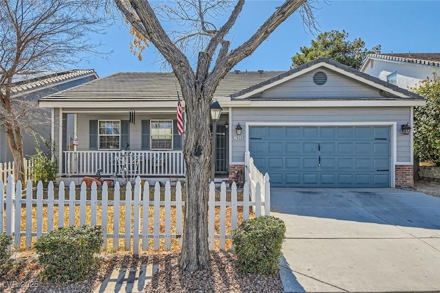 single story home featuring a garage, driveway, a porch, and a fenced front yard