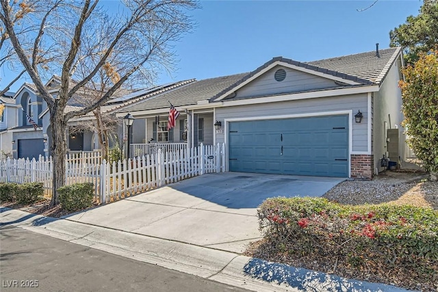 ranch-style house with a fenced front yard, a tile roof, brick siding, a garage, and driveway