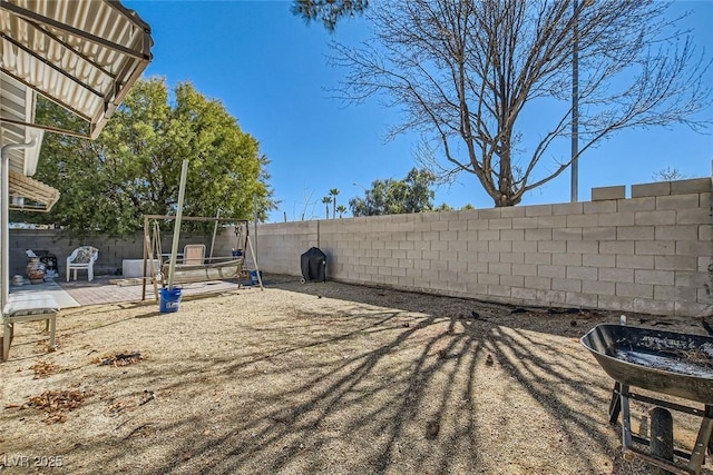 view of yard featuring a fenced backyard and a patio