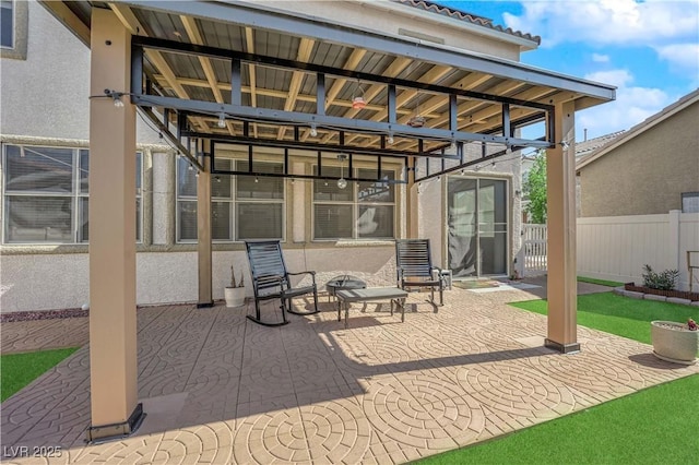 view of patio / terrace with fence