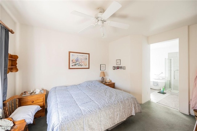 carpeted bedroom with connected bathroom and a ceiling fan