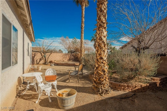 view of patio with a fenced backyard