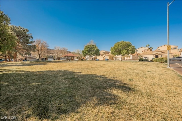 view of yard featuring a residential view