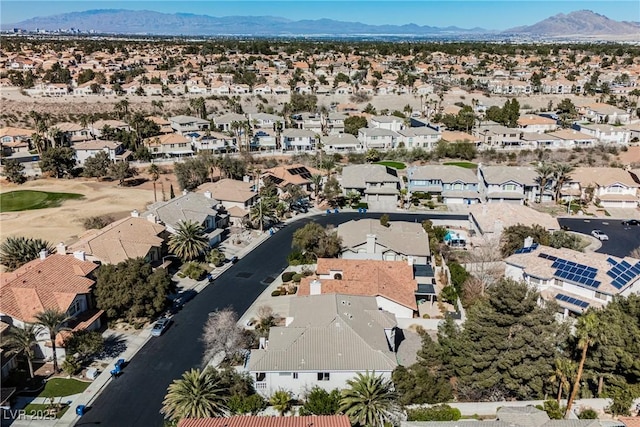 birds eye view of property with a residential view and a mountain view