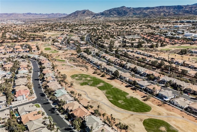 bird's eye view with a residential view, a mountain view, and golf course view