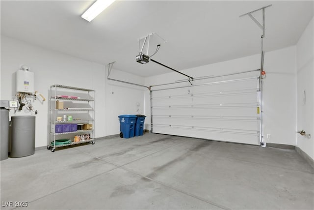 garage with tankless water heater and a garage door opener