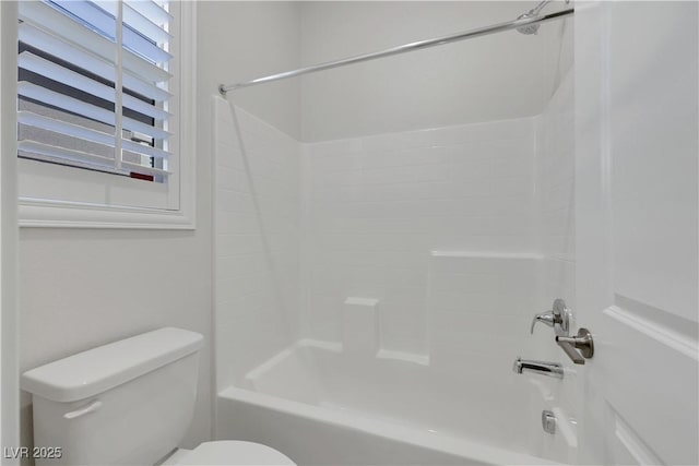 full bath with shower / bath combination and toilet