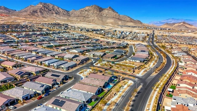 drone / aerial view with a residential view and a mountain view