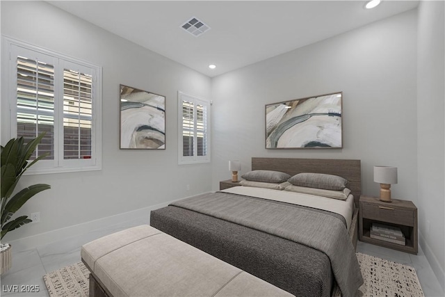 bedroom with recessed lighting, visible vents, and baseboards