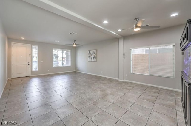 unfurnished living room featuring light tile patterned floors, a ceiling fan, and recessed lighting