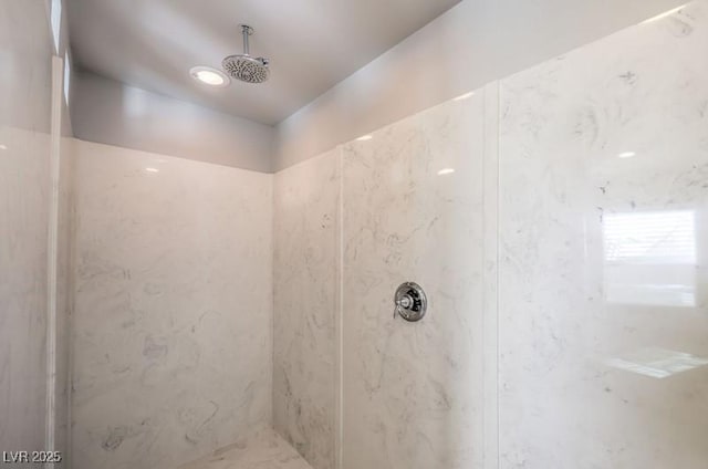 full bath with a marble finish shower