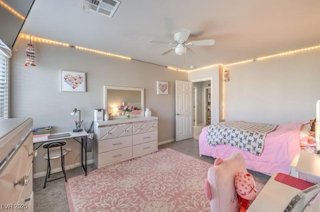 bedroom featuring light carpet, baseboards, visible vents, and a ceiling fan