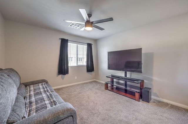 carpeted living area with visible vents, ceiling fan, and baseboards