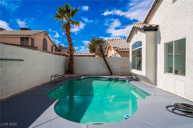 view of swimming pool featuring a fenced in pool and a fenced backyard