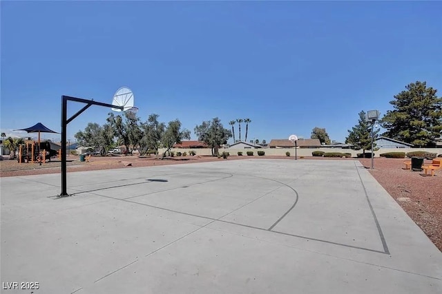 view of basketball court with community basketball court and playground community