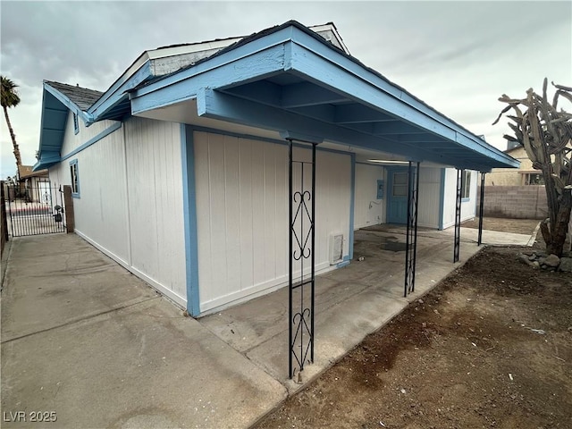 view of outdoor structure with fence