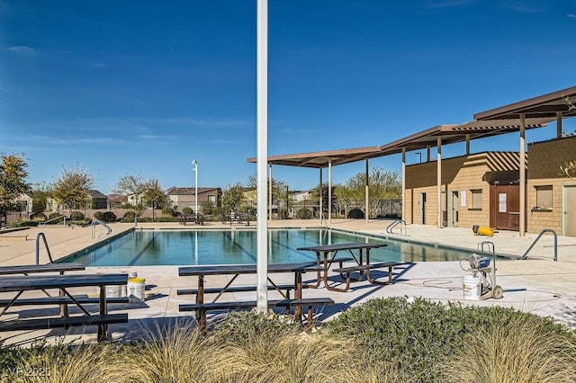 pool with a patio area