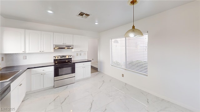 kitchen featuring appliances with stainless steel finishes, marble finish floor, under cabinet range hood, white cabinetry, and a sink