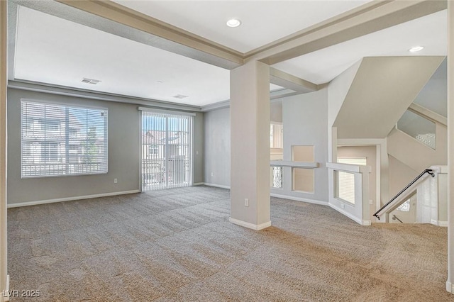 unfurnished living room featuring baseboards, visible vents, carpet flooring, and recessed lighting