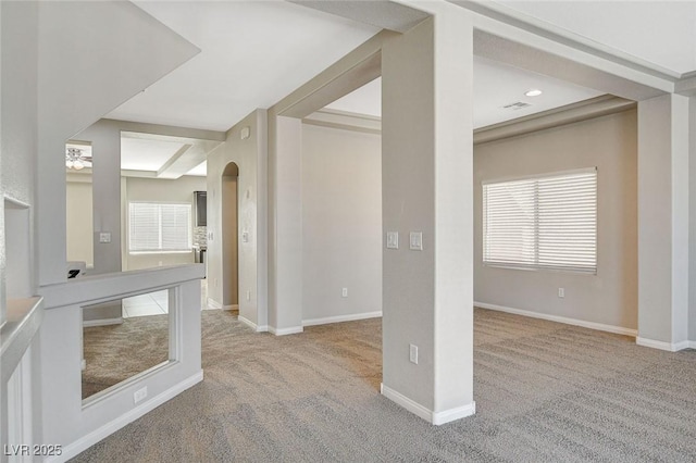 interior space featuring carpet and baseboards