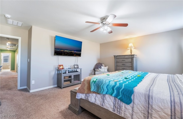 bedroom with ceiling fan, carpet floors, visible vents, and baseboards