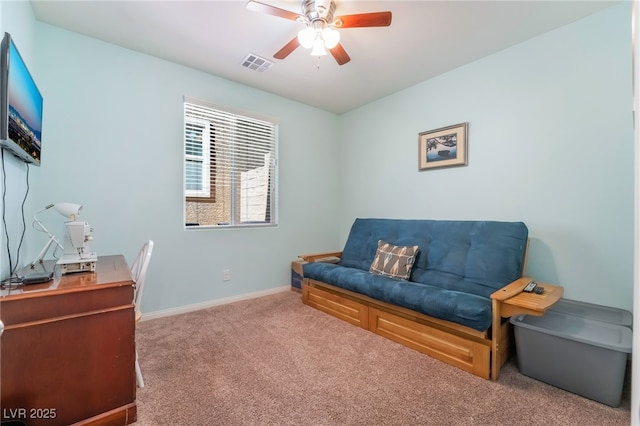 interior space with ceiling fan, visible vents, and baseboards