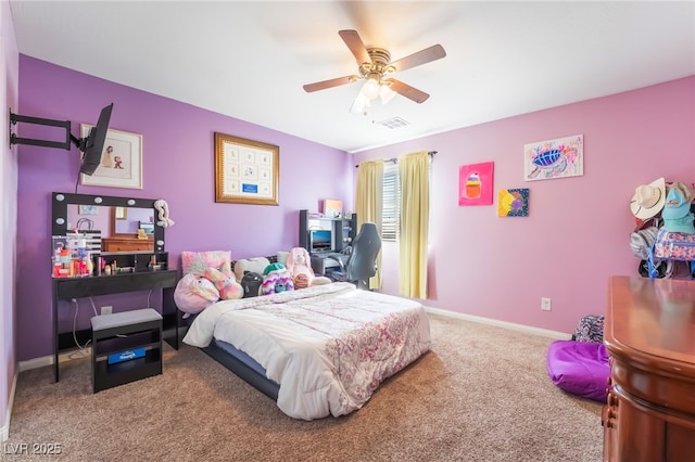 carpeted bedroom with baseboards, visible vents, and ceiling fan