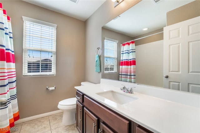 bathroom featuring toilet, tile patterned floors, vanity, baseboards, and a shower with curtain