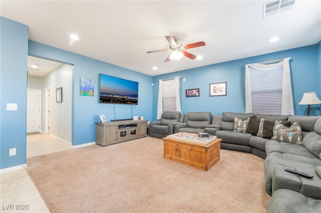 carpeted living room featuring recessed lighting, visible vents, and ceiling fan