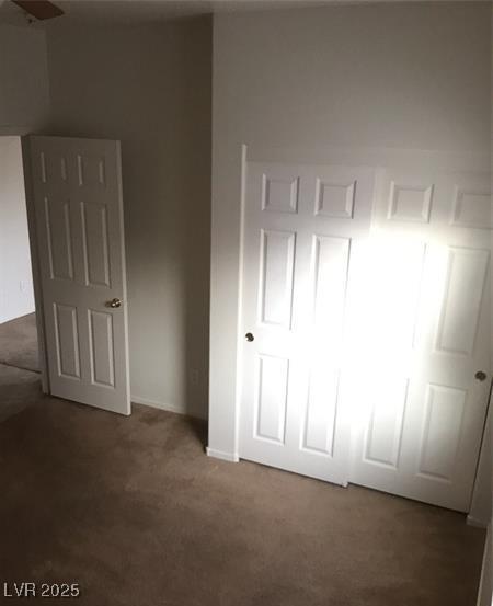 unfurnished bedroom featuring carpet flooring