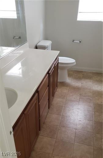 full bath with vanity and toilet