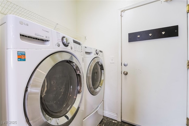 laundry room featuring laundry area and washer and clothes dryer