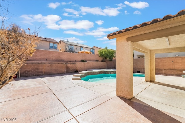 view of swimming pool with a patio, a fenced backyard, and a fenced in pool