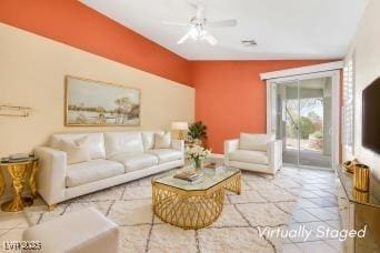 living area with a ceiling fan