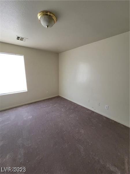 spare room with visible vents