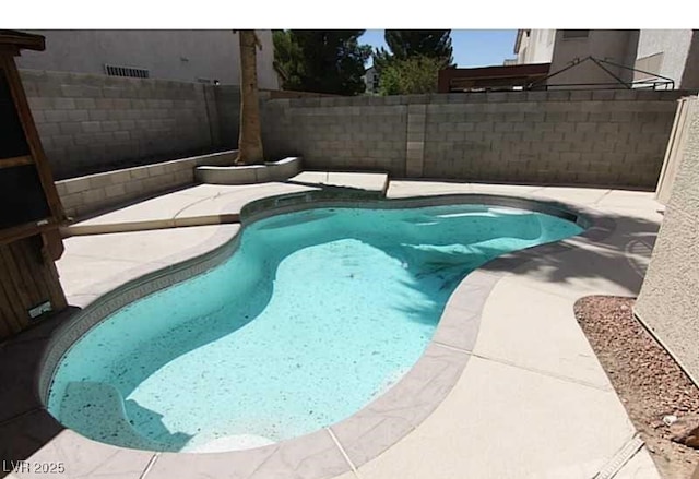 view of pool with a fenced backyard and a fenced in pool