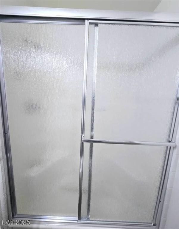 bathroom featuring a stall shower