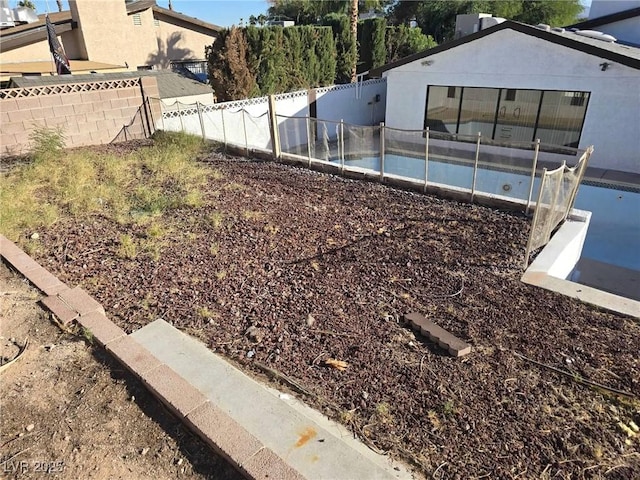 view of yard with a fenced backyard